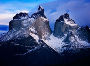 A hiker on a high-altitude trail in the Andes Mountains